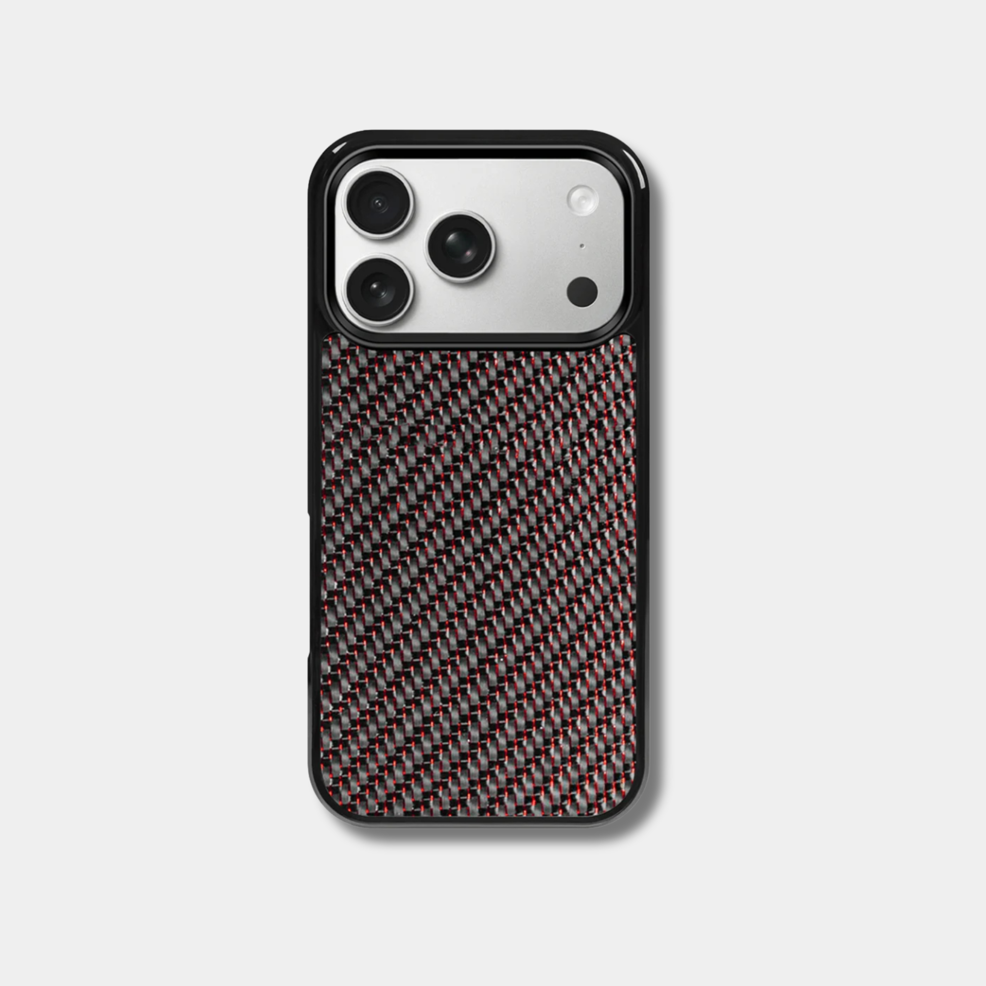 Coque Apple iPhone en fibre de carbone colorée de la marque Fibernium, montrant la texture élégante et résistante du matériau.